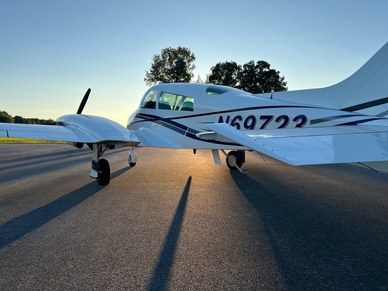 Aircraft by Armbruster twin-engine aircraft on the ramp at sunset